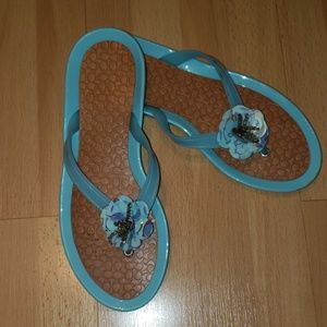 Coach Flower Jelly Sandals.